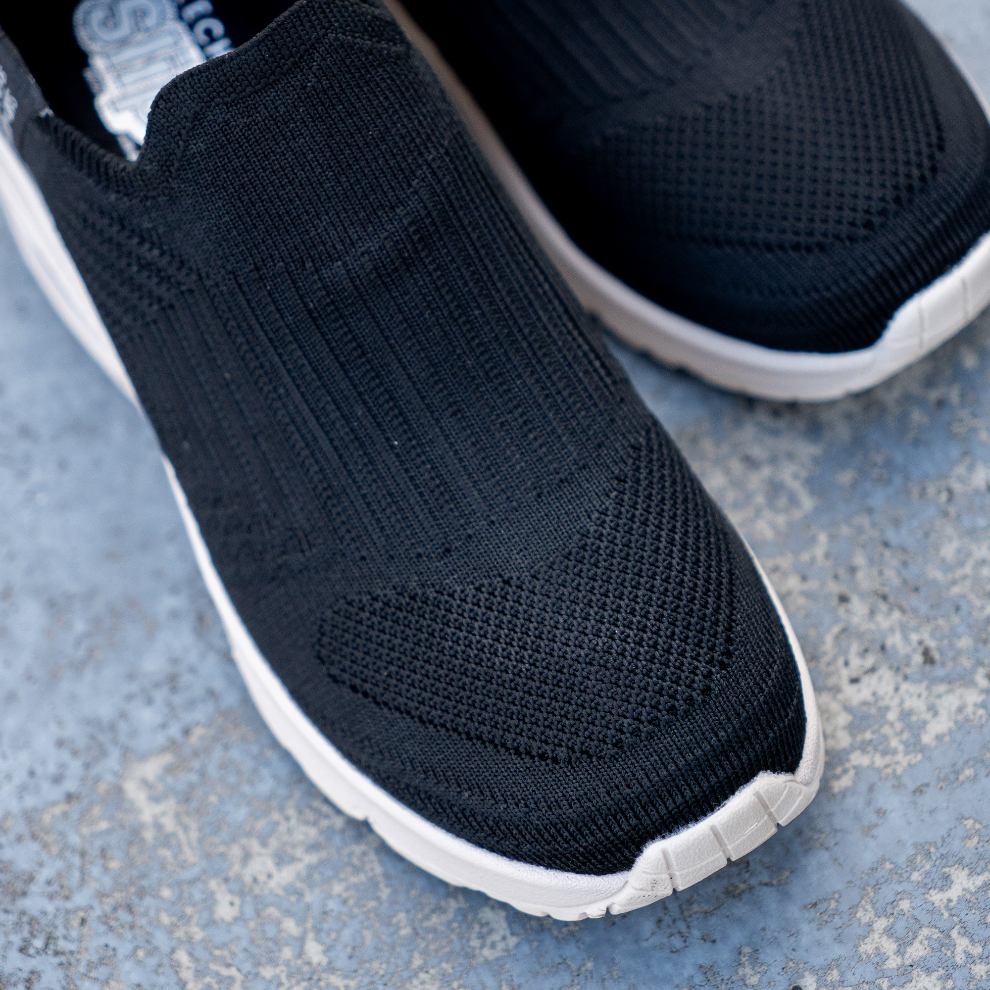 SKECHERS SLIP-INS ウノウェッジキッキングニット スケッチャーズ スリップインズ：ウノ ウェッジ - キッキング